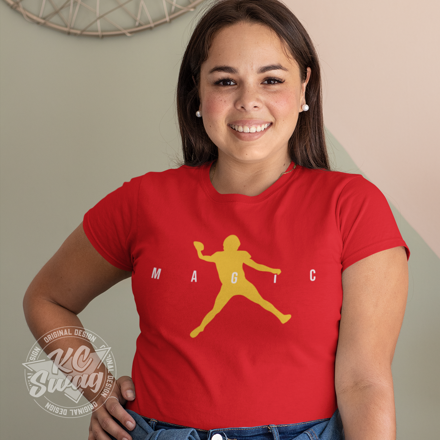 KC Swag - Kansas City Chiefs MAGIC AIR MAHOMES on red unisex t-shirt worn by female model standing in front of beige apartment wall