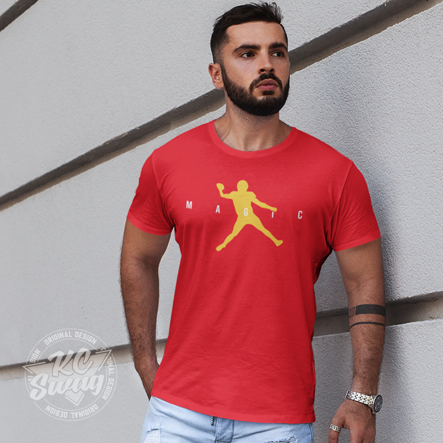 KC Swag - Kansas City Chiefs MAGIC AIR MAHOMES on red unisex t-shirt worn by male model leaning against a white concrete slotted wall