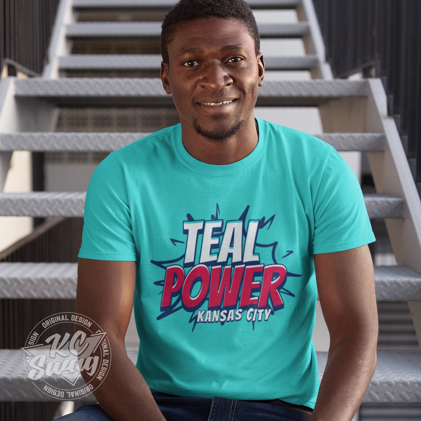 KC Swag - Kansas City Current, Teal Power KC design on teal unisex t-shirt worn by male model sitting on an outdoor metal staircase