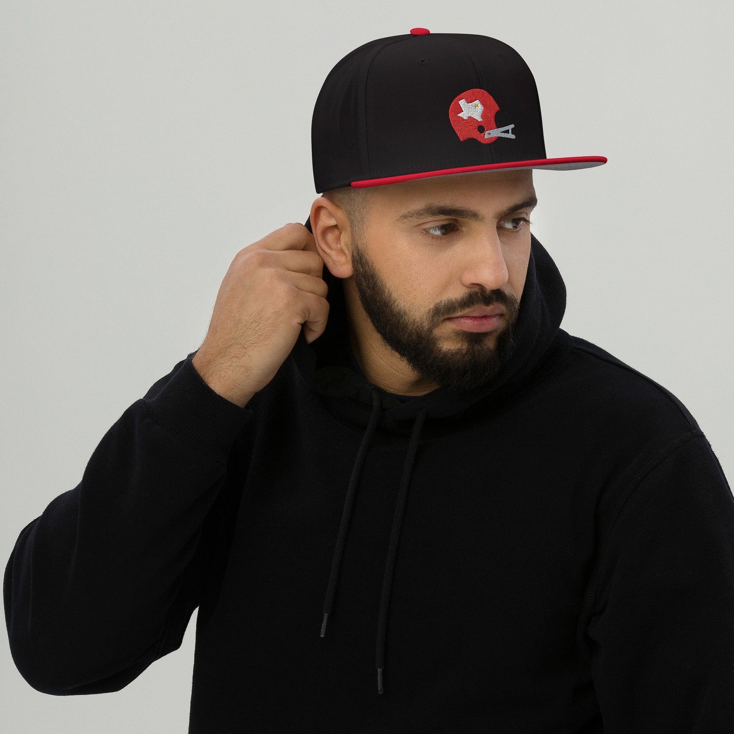 KC SWag Kansas City Chiefs Black/Red Texans Helmet Flat Snapback hat worn by male model