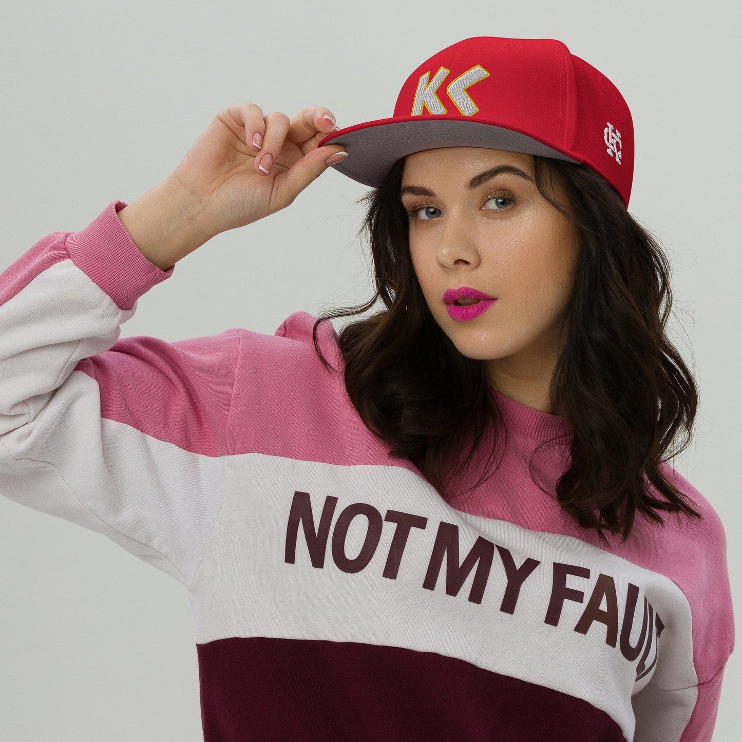 KC SWag Kansas City Chiefs red Greek KC Flat Snapback hat worn by female model