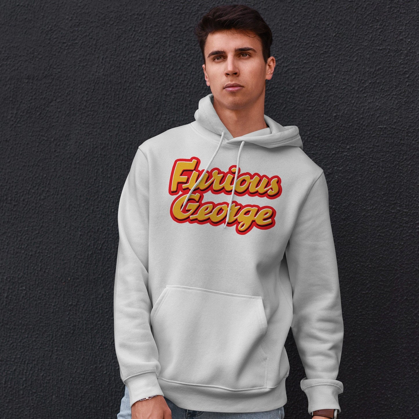 KC Swag | Kansas City Chiefs red/gold FURIOUS GEORGE on white sponge-fleece pullover hoodie worn by male model standing in front of a dark gray wall