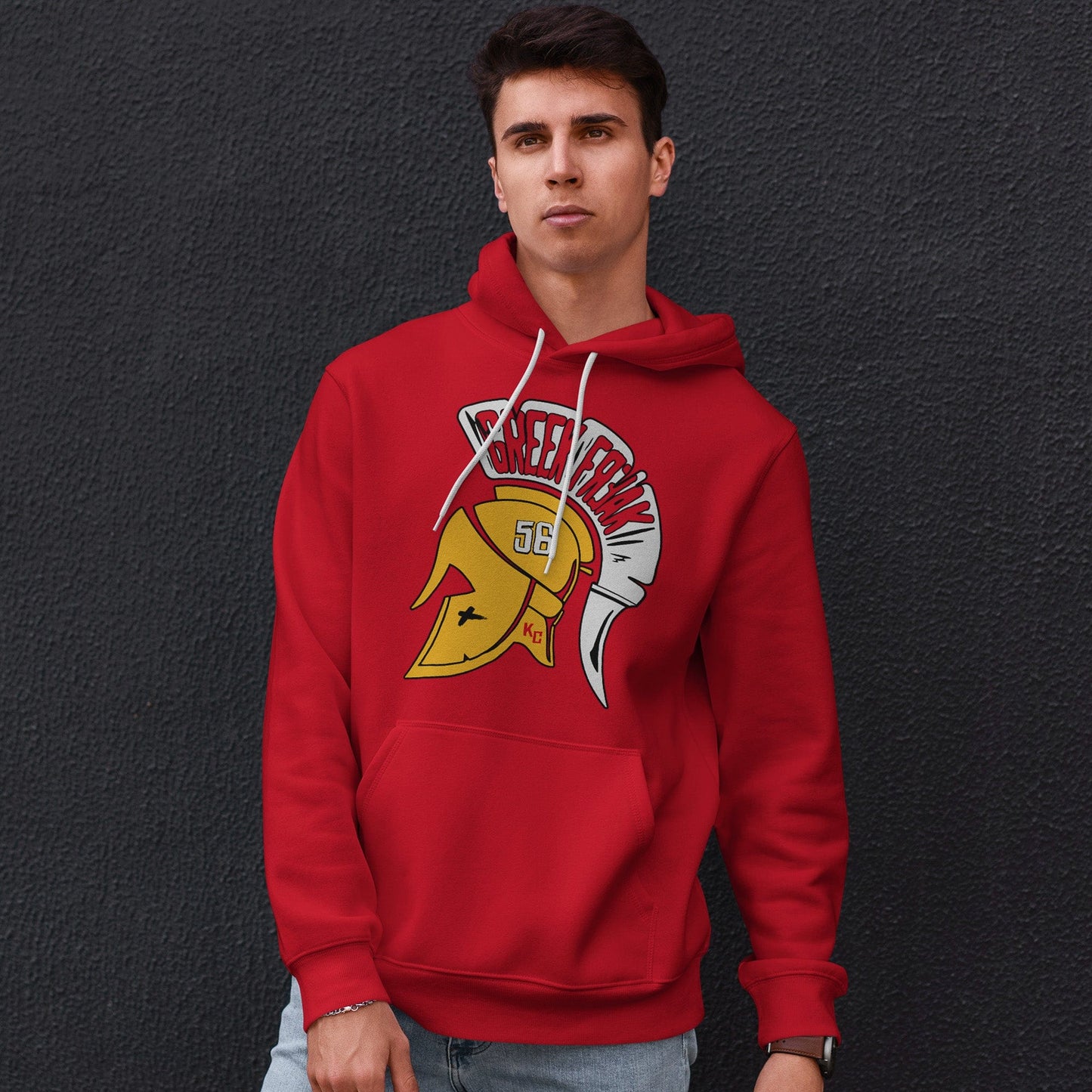 KC Swag | Kansas City Chiefs white/gold GREAT FREAK 56 on red sponge-fleece pullover hoodie worn by male model standing in front of dark gray wall