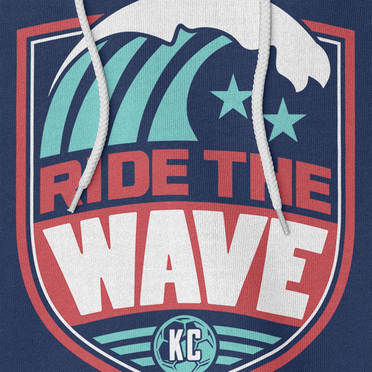 KC Swag Kansas City Current RIDE THE WAVE on navy fleece pullover hoodie closeup details of printed graphics