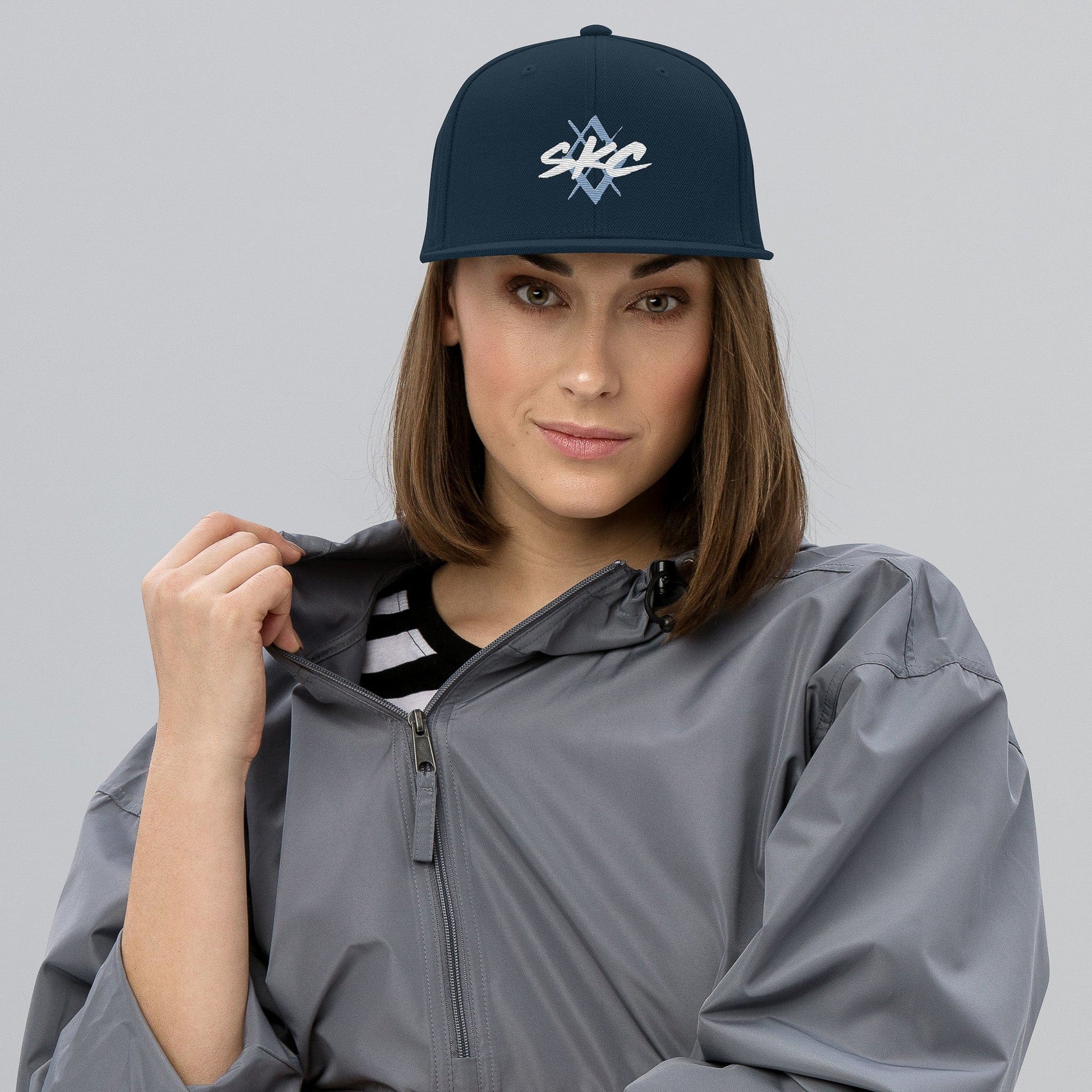 KC Swag Sporting Kansas City Navy SKC Diamond Flat Snapback Hat worn by female model