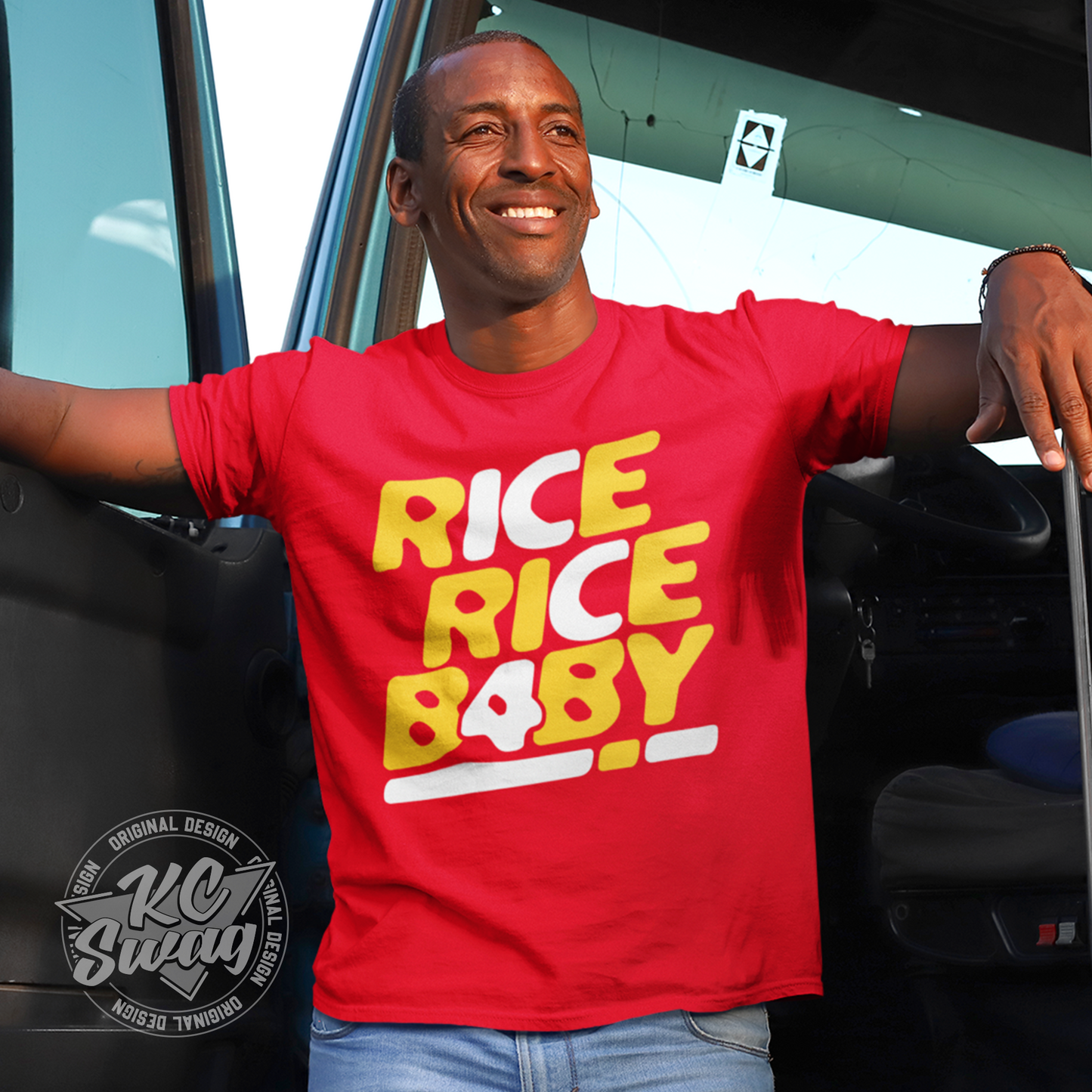 KC Swag - Kansas City Chiefs RICE RICE BABY KC 4 on red unisex t-shirt worn by male model standing on the cab of a semi truck with the door open