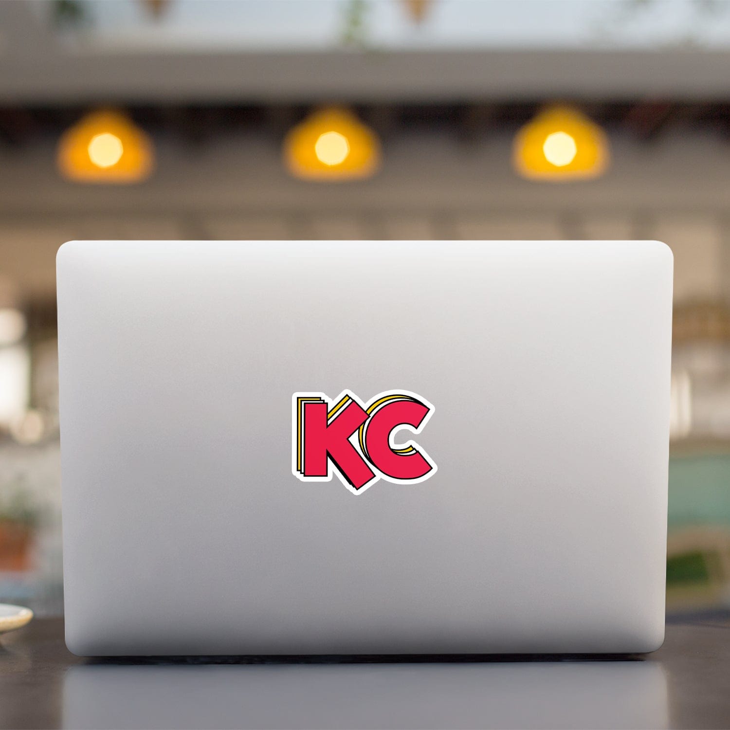 KC Swag Kansas City Chiefs red, yellow STACKED RED KC vinyl die cut decal sticker on open laptop back