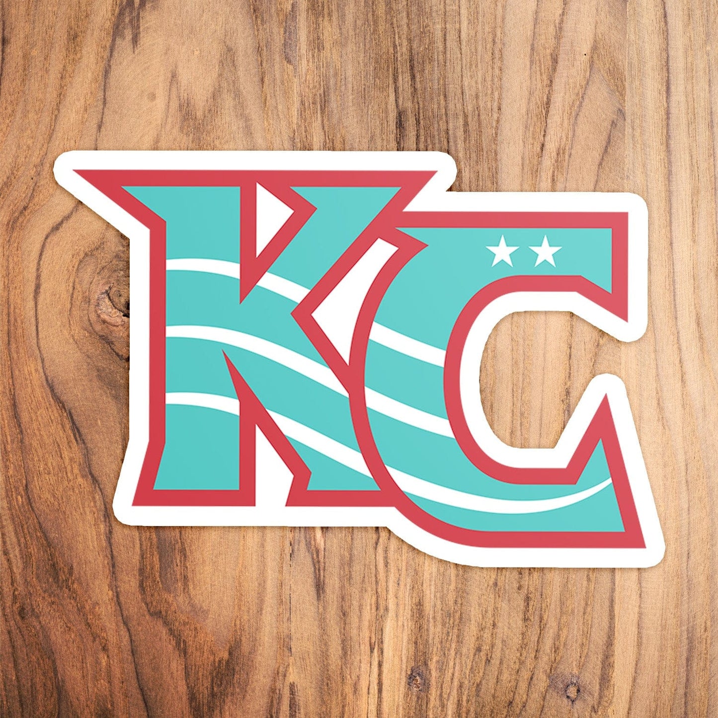 KC Swag Kansas City Current CURRENT KC die-cut sticker decal made from waterproof vinyl on wood table