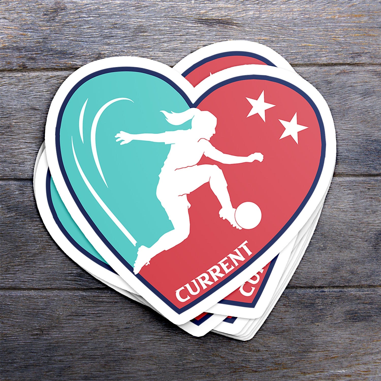 KC Swag Kansas City Current PLAYER HEART die-cut sticker decal made from waterproof vinyl stack on dark wood table