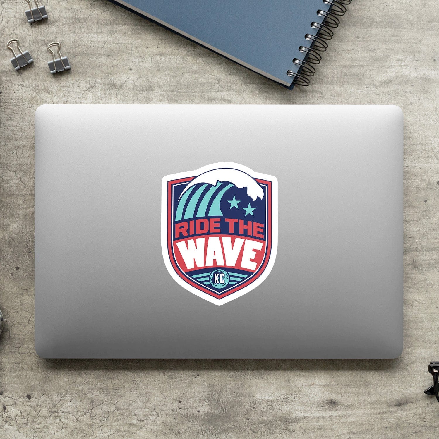 KC Swag Kansas City Current RIDE THE WAVE die-cut sticker decal made from waterproof vinyl on closed laptop back 
