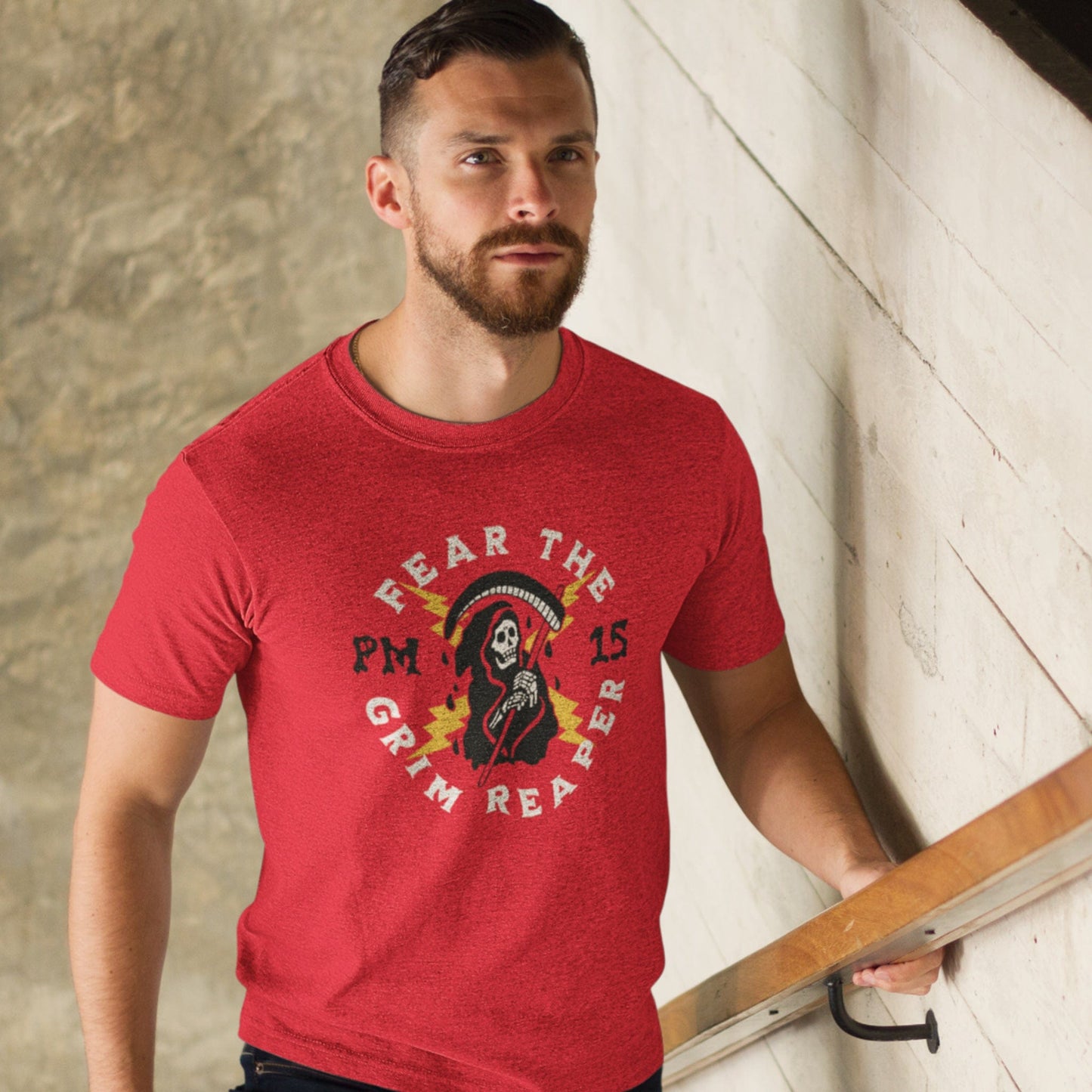 KC Swag Kansas City Chiefs GRIM REAPER PM15 on heather red t-shirt worn by male model in urban stairwell