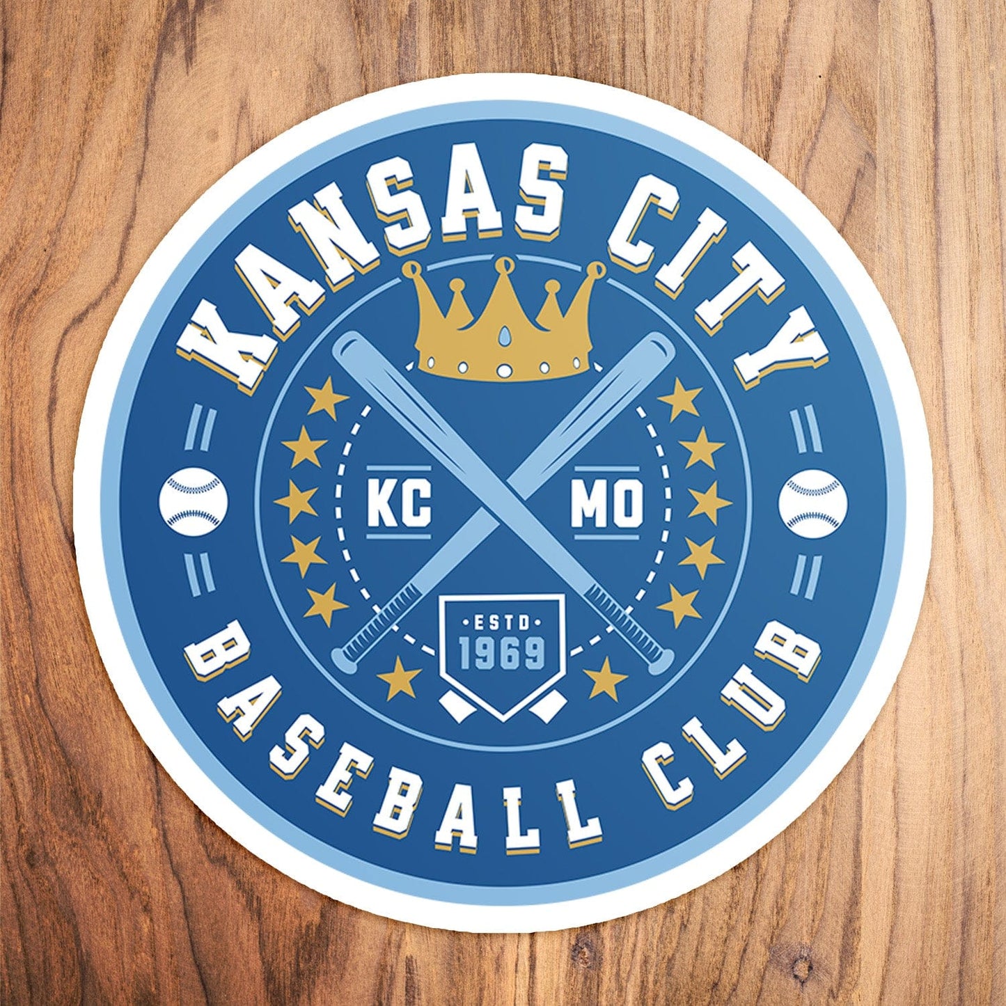 KC Swag Kansas City Royals blue, gold, powder blue KC BASEBALL CLUB vinyl die cut decal sticker on wood table