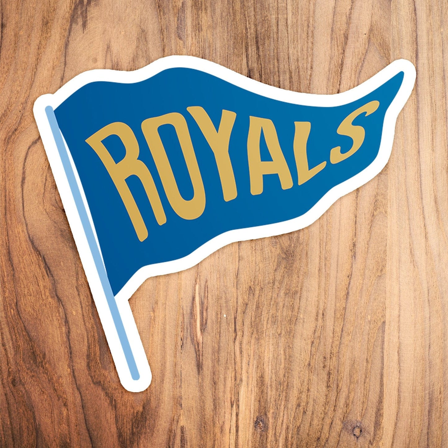 KC Swag Kansas City Royals blue, gold, powder Royals Pennant vinyl die cut decal sticker on wood table