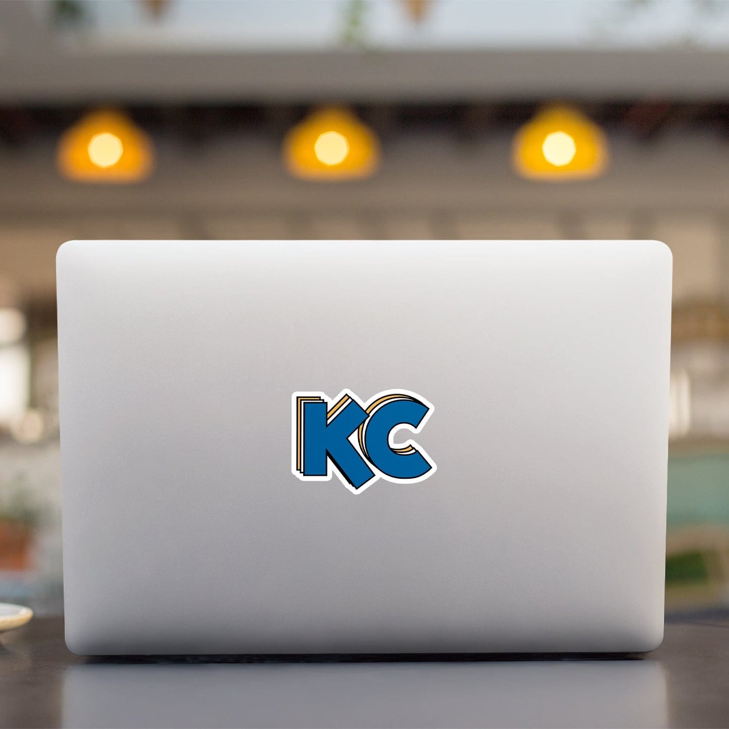 KC Swag Kansas City Royals blue, gold, white Stacked Blue KC vinyl die cut decal sticker on open laptop back