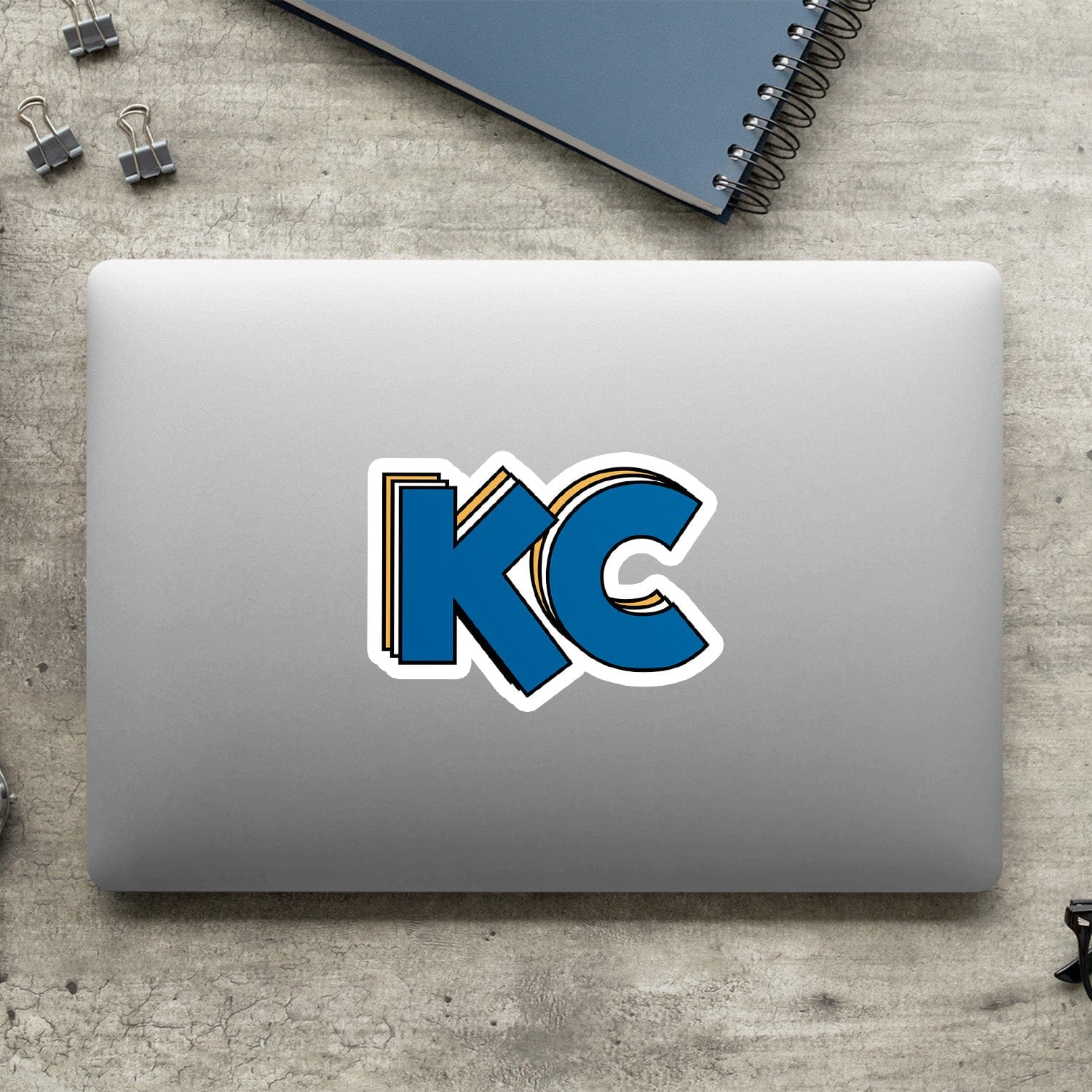 KC Swag Kansas City Royals blue, gold, white Stacked Blue KC vinyl die cut decal sticker on closed laptop back