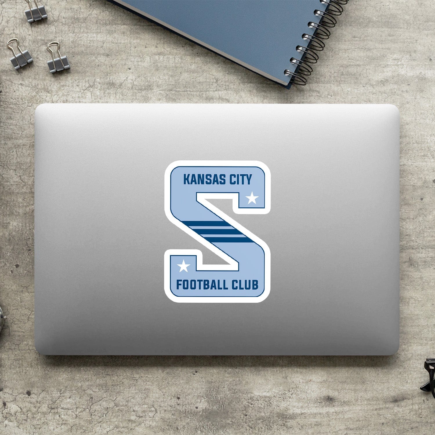 KC Swag Sporting Kansas City powder, navy, white KC Football Club S vinyl die cut decal sticker on closed laptop back