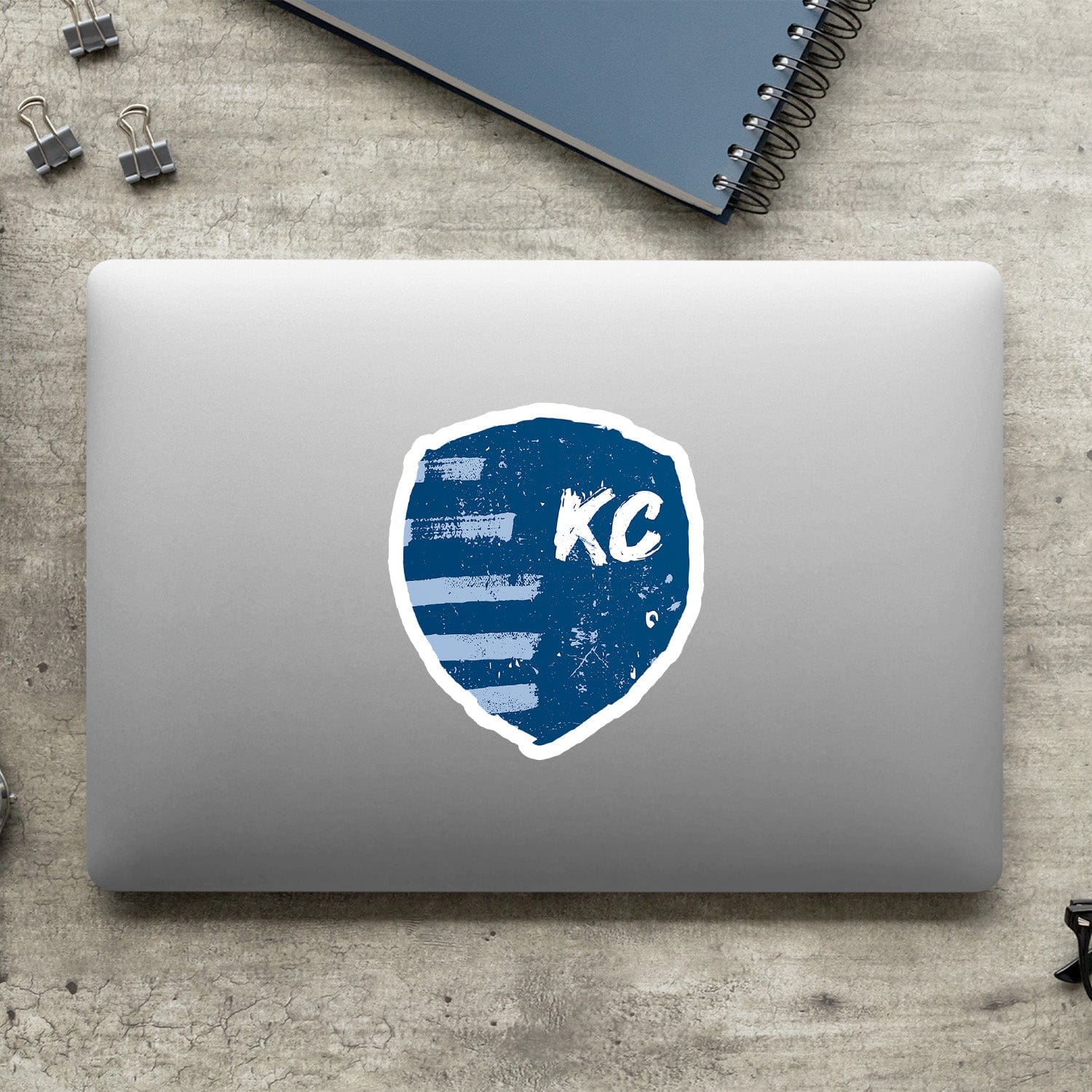 KC Swag Sporting Kansas City powder, navy, white Painted Shield vinyl die cut decal sticker on closed laptop back