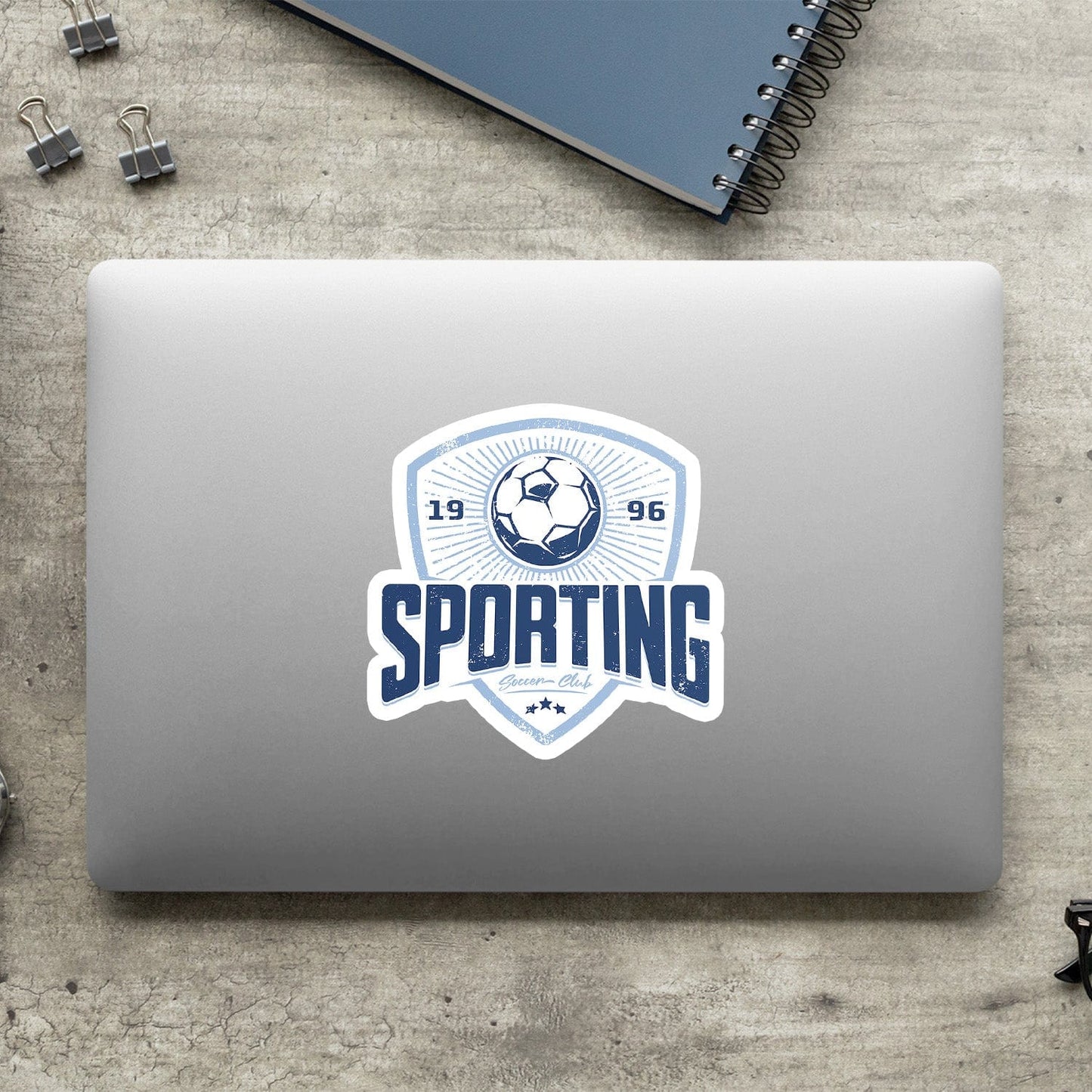 KC Swag Sporting Kansas City powder, navy Sporting Club vinyl die cut decal sticker on closed laptop back