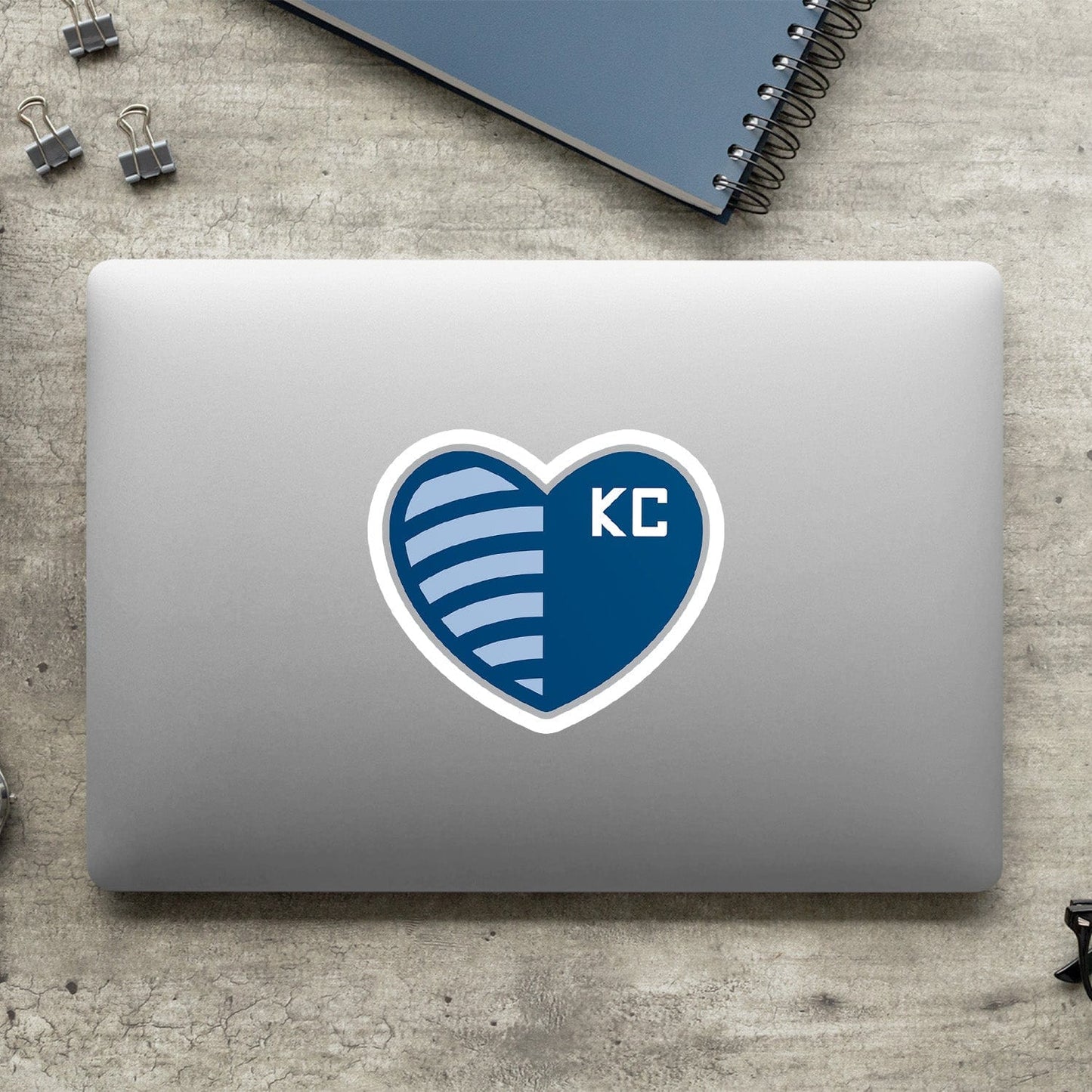 KC Swag Sporting Kansas City powder, navy, silver Shield Heart vinyl die cut decal sticker on closed laptop back